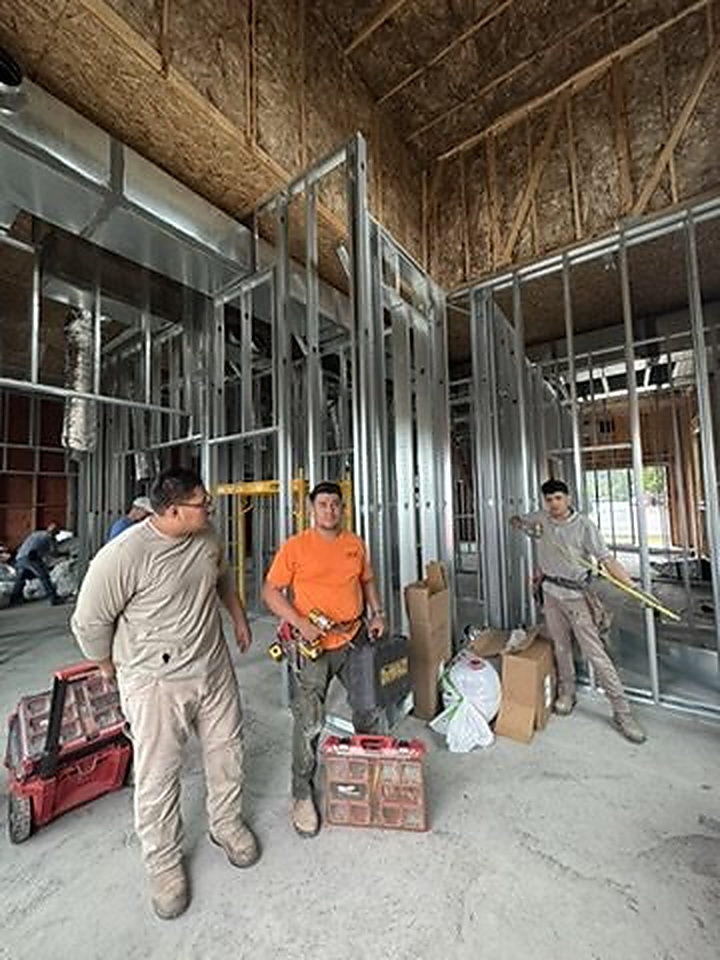Quick Wall Construction Co. crew on a commercial jobsite