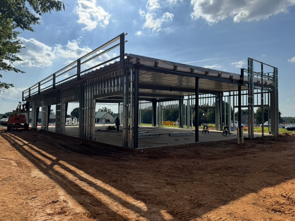 Exterior commercial metal framing in progress on a North Carolina project