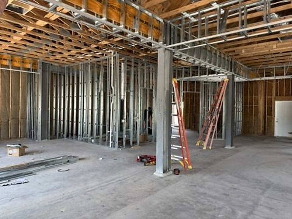Interior metal framing prepared for drywall installation on a commercial project