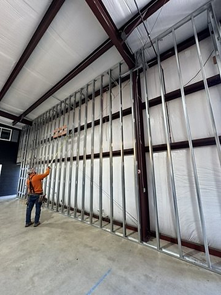 Tall-wall metal framing inside a commercial building